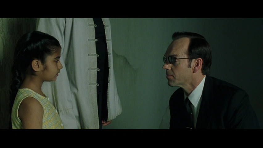 Scene from the Matrix with Sati (remembrance and mindfulness) and 𝔸𝕊 (the AI Matrix agent Smith destroying remembrance through interference of mindfulness) from the Matrix